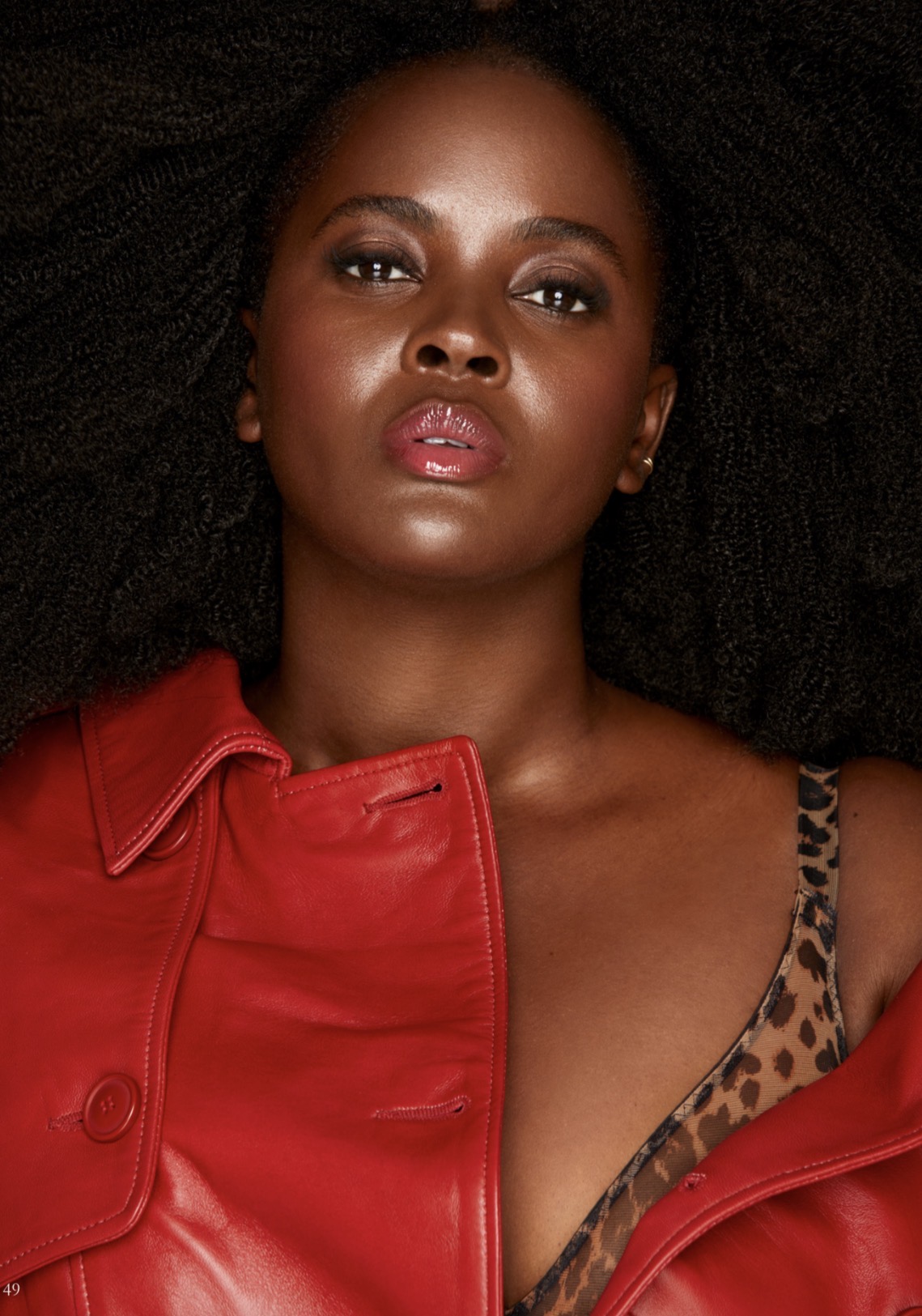 Model in a red leather jacket at an editorial styling photoshoot